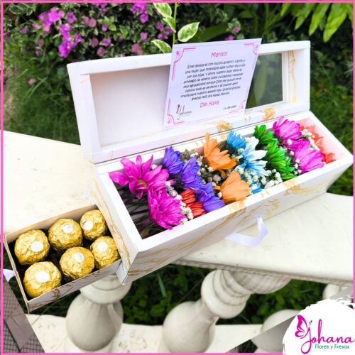 caja de flores de colores y chocolates